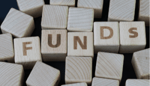 Wooden blocks with the word Funds written on