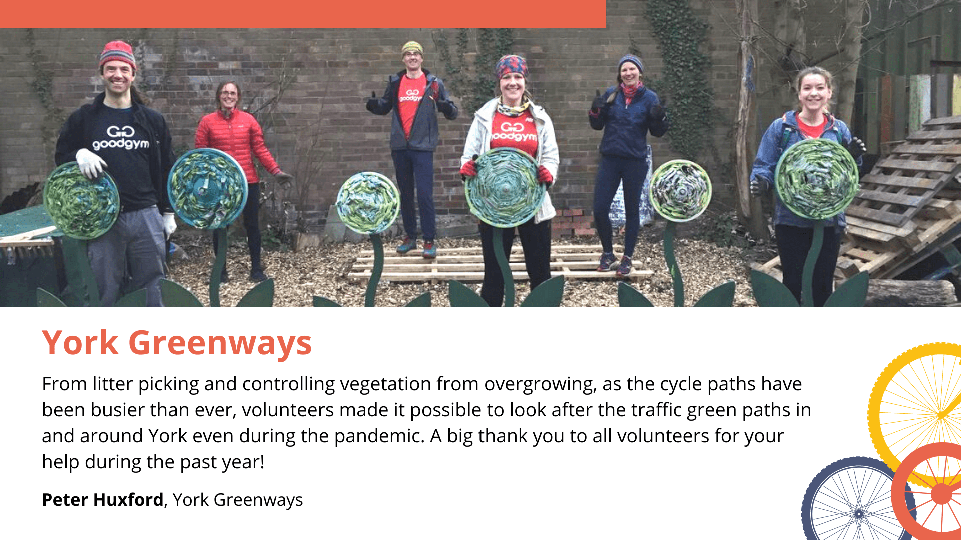 York Greenways Image of six volunteers with GoodGym t-shirt on, wooly hats and coats stood outside infront of 6 metal flower sculptures.