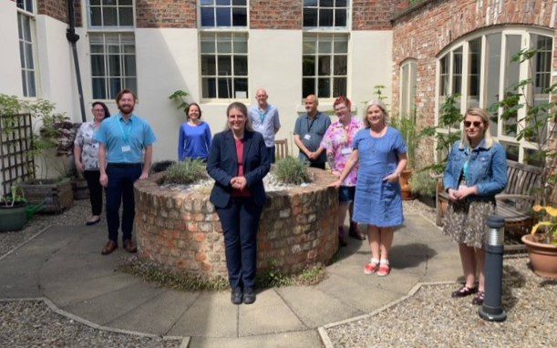 Rachael Maskell Visit A photo of Rachael Maskell (local MP and Shadow Minister for the Voluntary Sector and Charities) and different representatives from the local VCSE Sector stood in the courtyard of the Priory Street Centre.