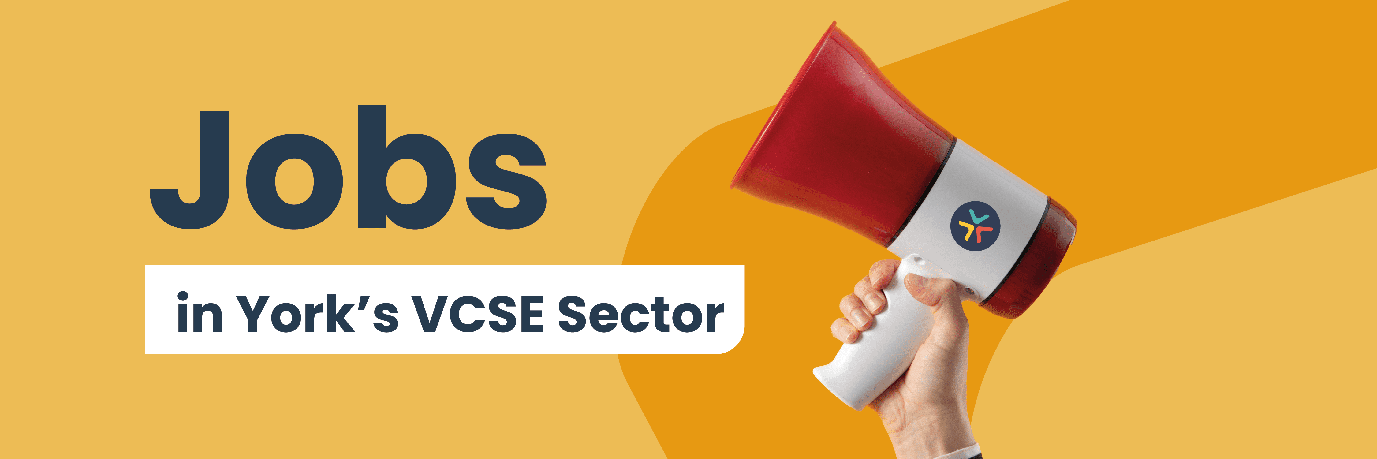 Image shows a hand holding a megaphone on a yellow background. The text reads Jobs in York's VCSE sector