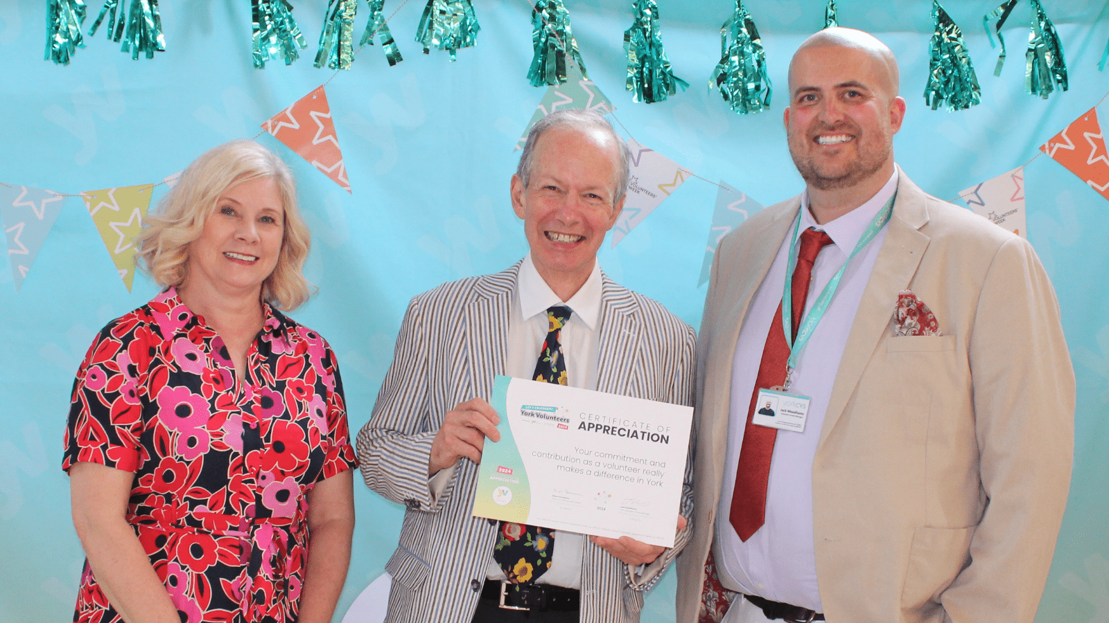 Thank you to David Image of Alison, David and Jack, presenting David with a Volunteer Appreciation Certificate