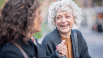 Close up image of an older woman smiling