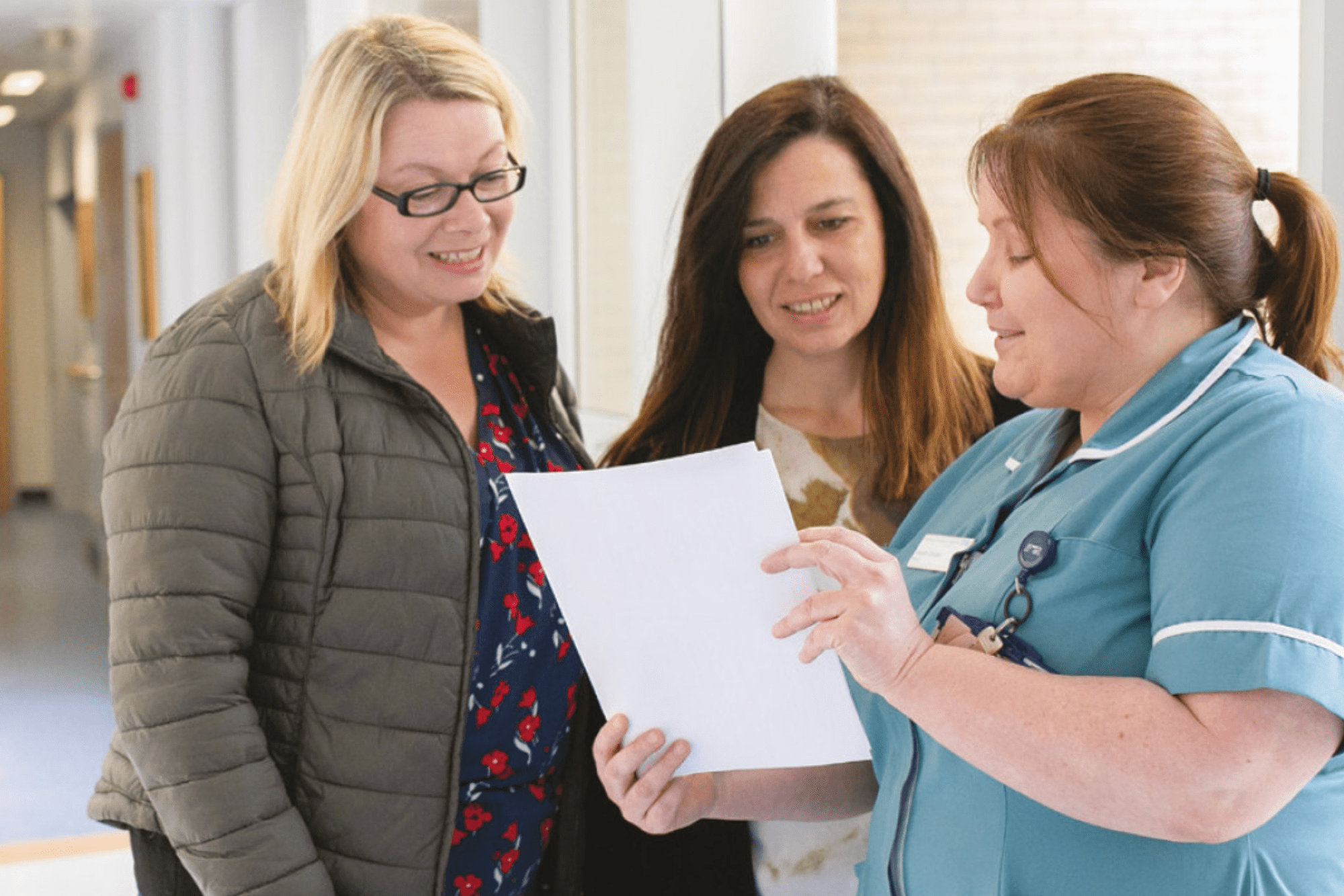 Image on two women speaking to a female nurse