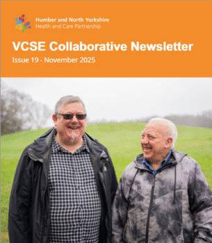 Two older men wearing jackets stand outdoors on a grassy hill under an overcast sky in a VCSE Collaborative newsletter cover.