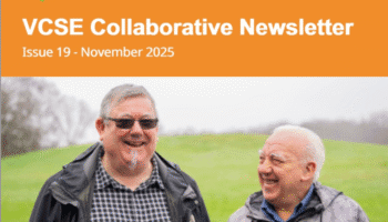 Two older men wearing jackets stand outdoors on a grassy hill under an overcast sky in a VCSE Collaborative newsletter cover.