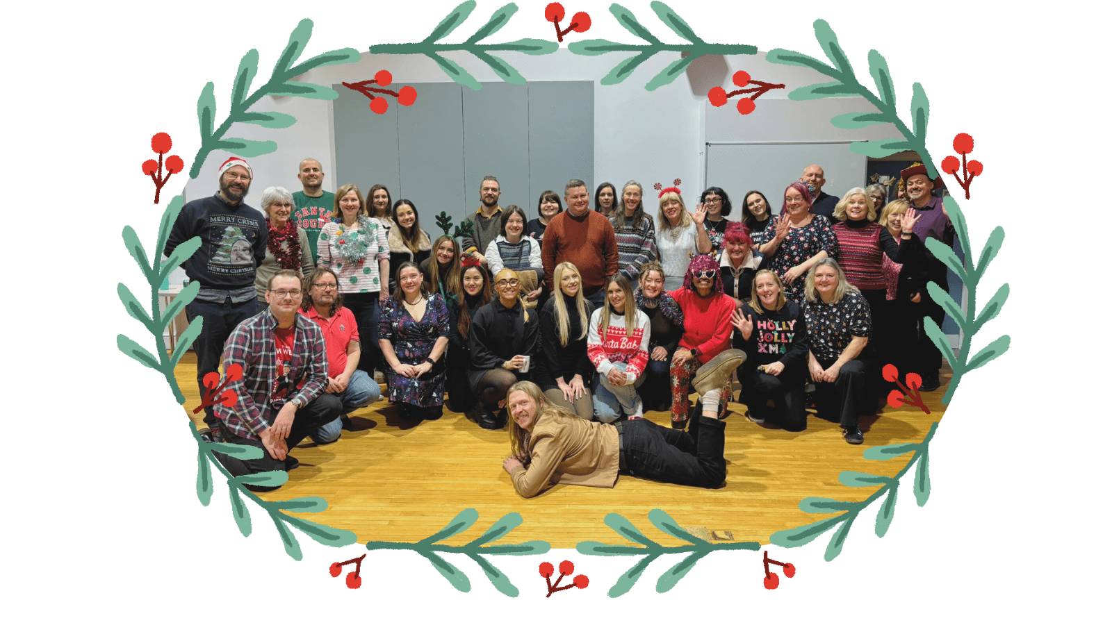 Image of the York CVS staff team together in the Main Hall at the Priory Street Centre