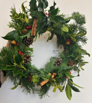 A completed festive christmas wreath.