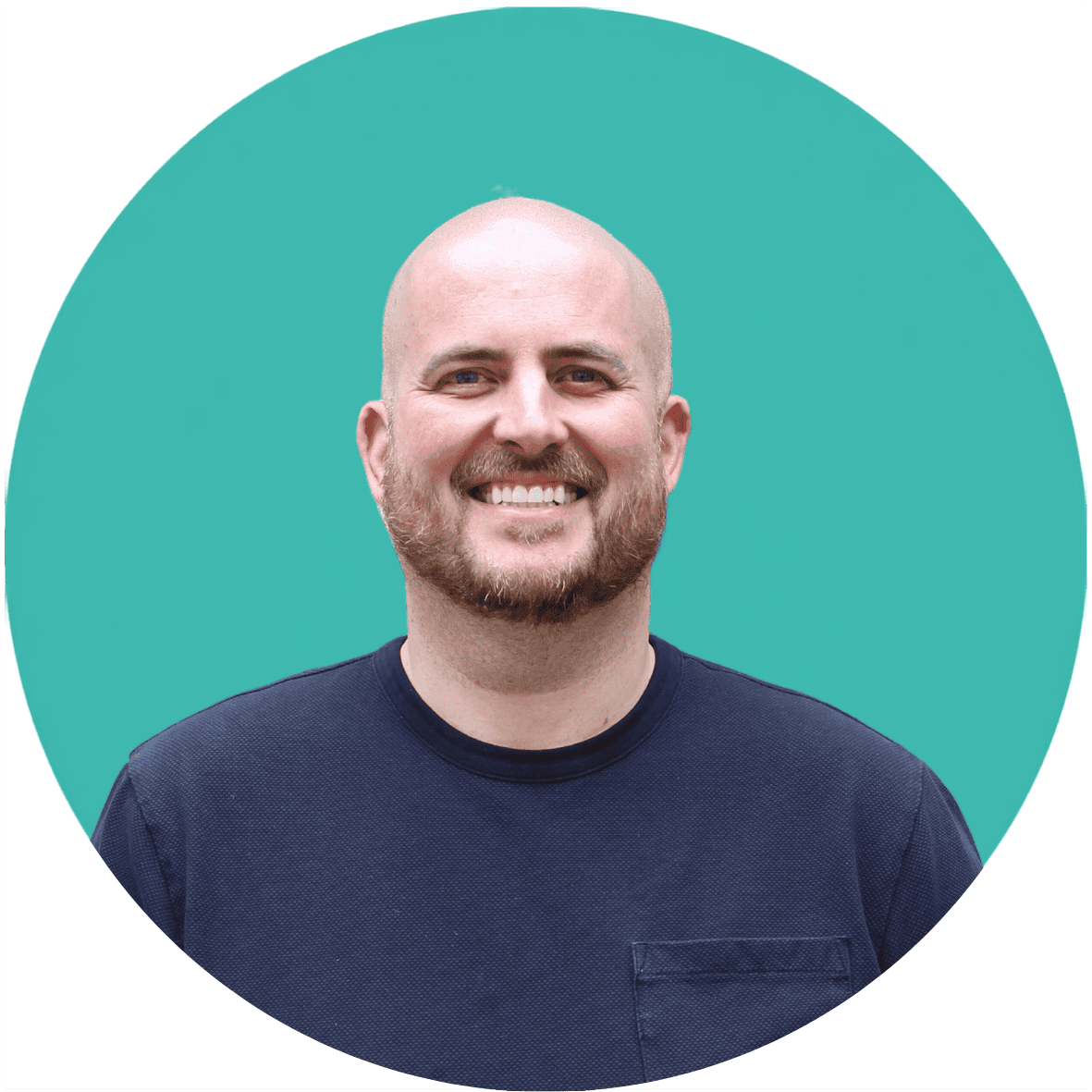 A headshot of Dr Jack Woodhams. He is a white male in his thirties with a shaved head ans a short beard. He is smiling at the camera