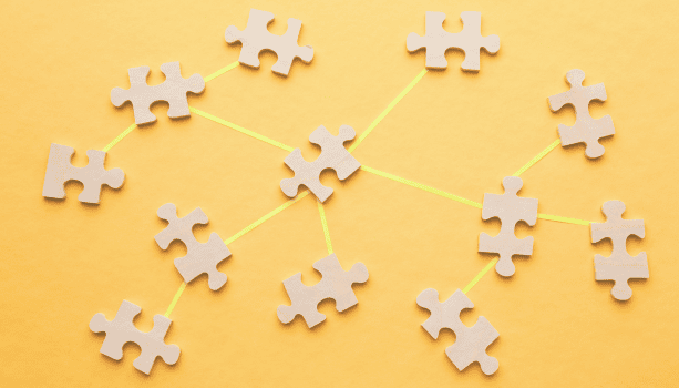 Lots of puzzles pieces being connected