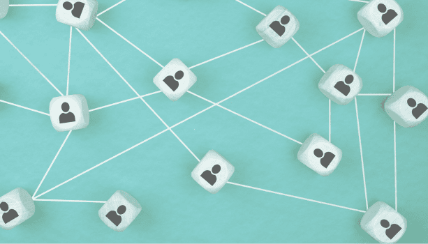 Image of wooden blocks with people on all connected together